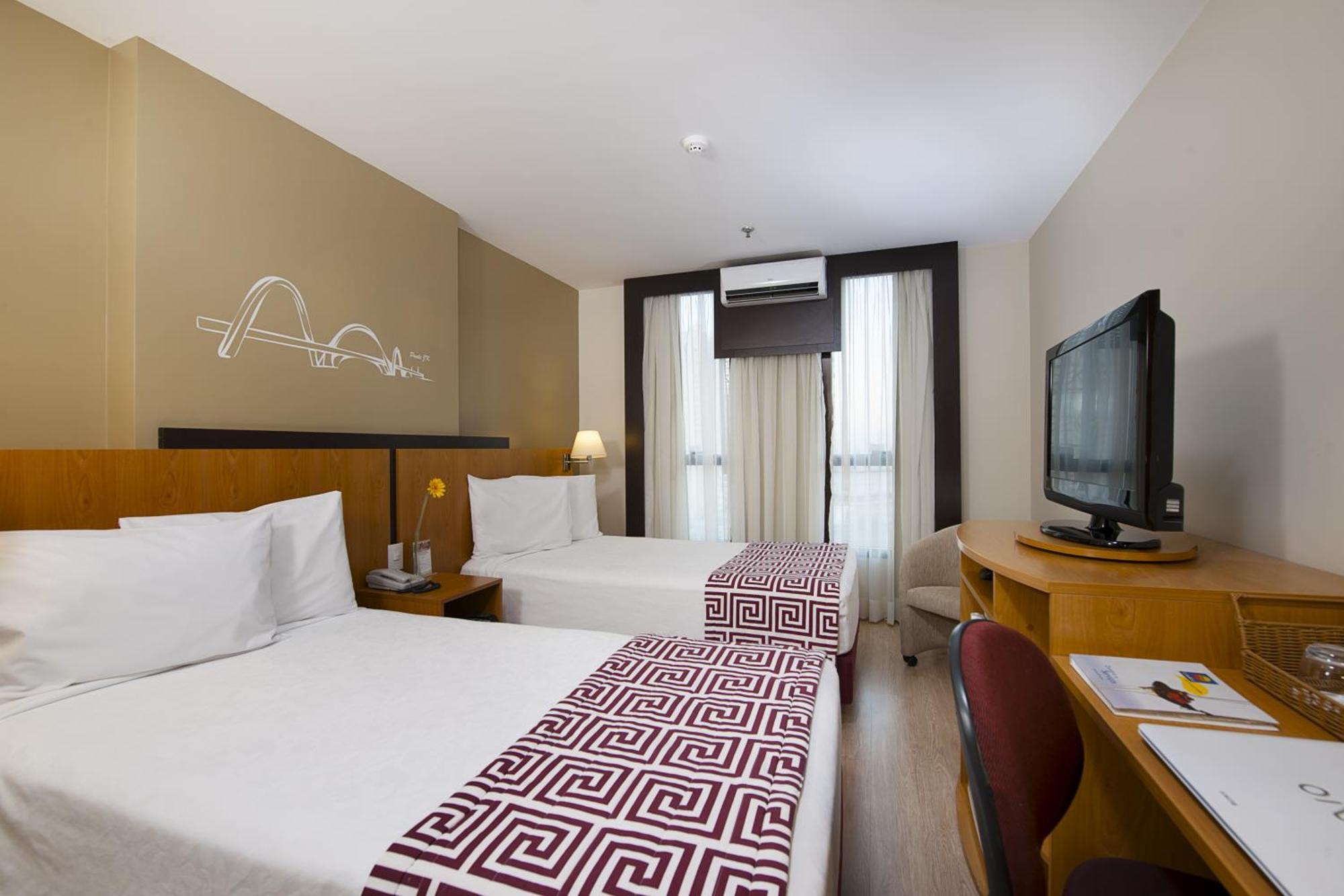 Comfort Hotel Тагуатинга Стая снимка